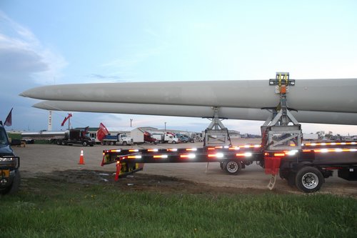 windmill blades on flatbed trailer