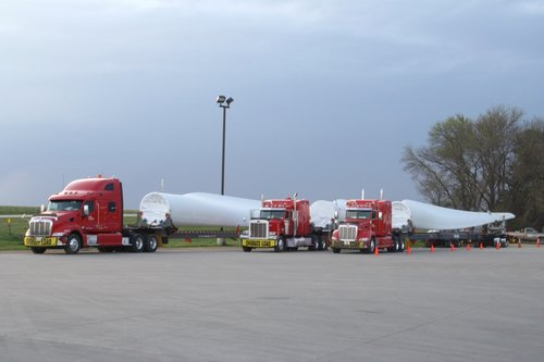 three loaded trucks